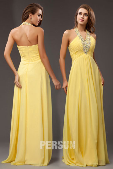 Robe de soirée mousseline jaune col V ornée de bijoux